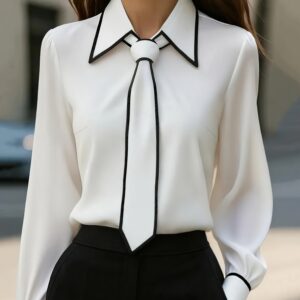Dolly - Blusa con contraste y lazo